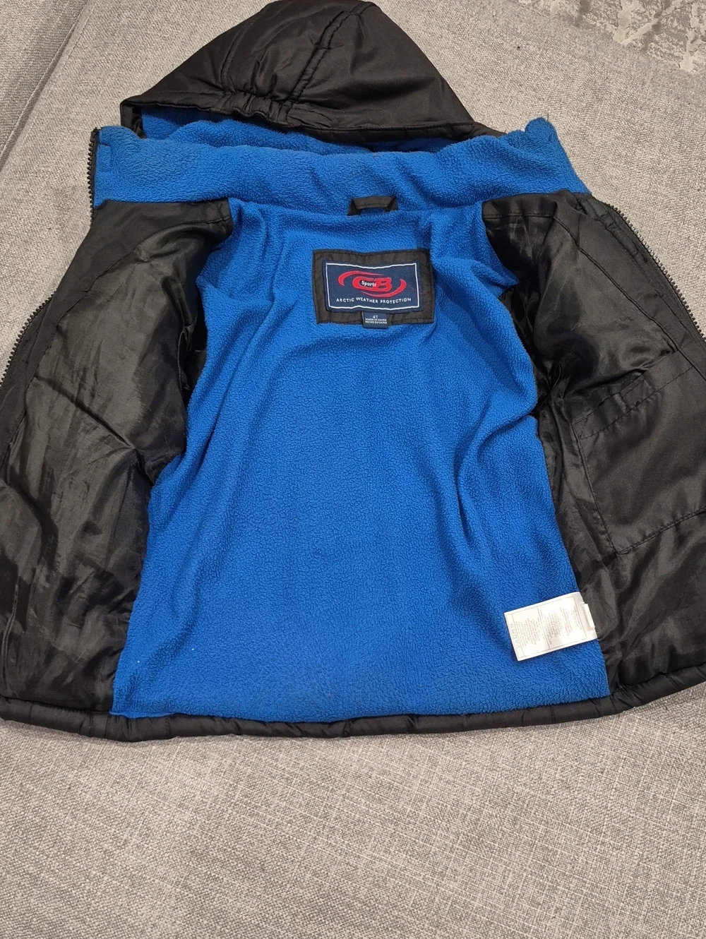 Kids Black Puffer Jacket with Blue Trim -